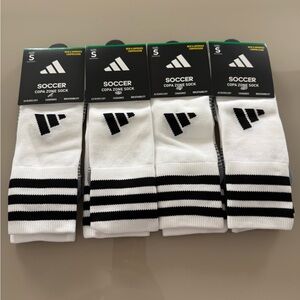 4 pairs of adidas Boys Copa Zone Soccer Socks - White 
Over the calf